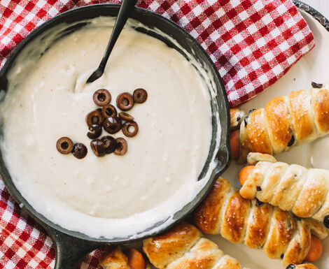 Rosemary & Olive Pretzel Dogs with Beer Cheese Dip